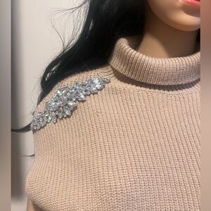 Light brown expresso sweater with rhinestones.